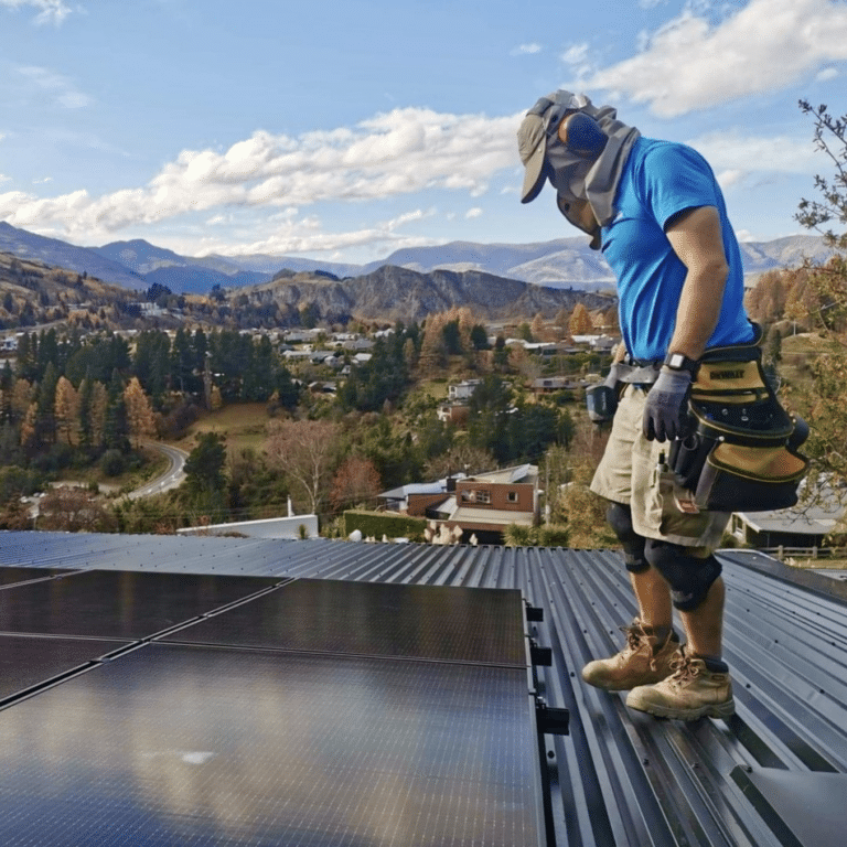 Solar Installer On Roof