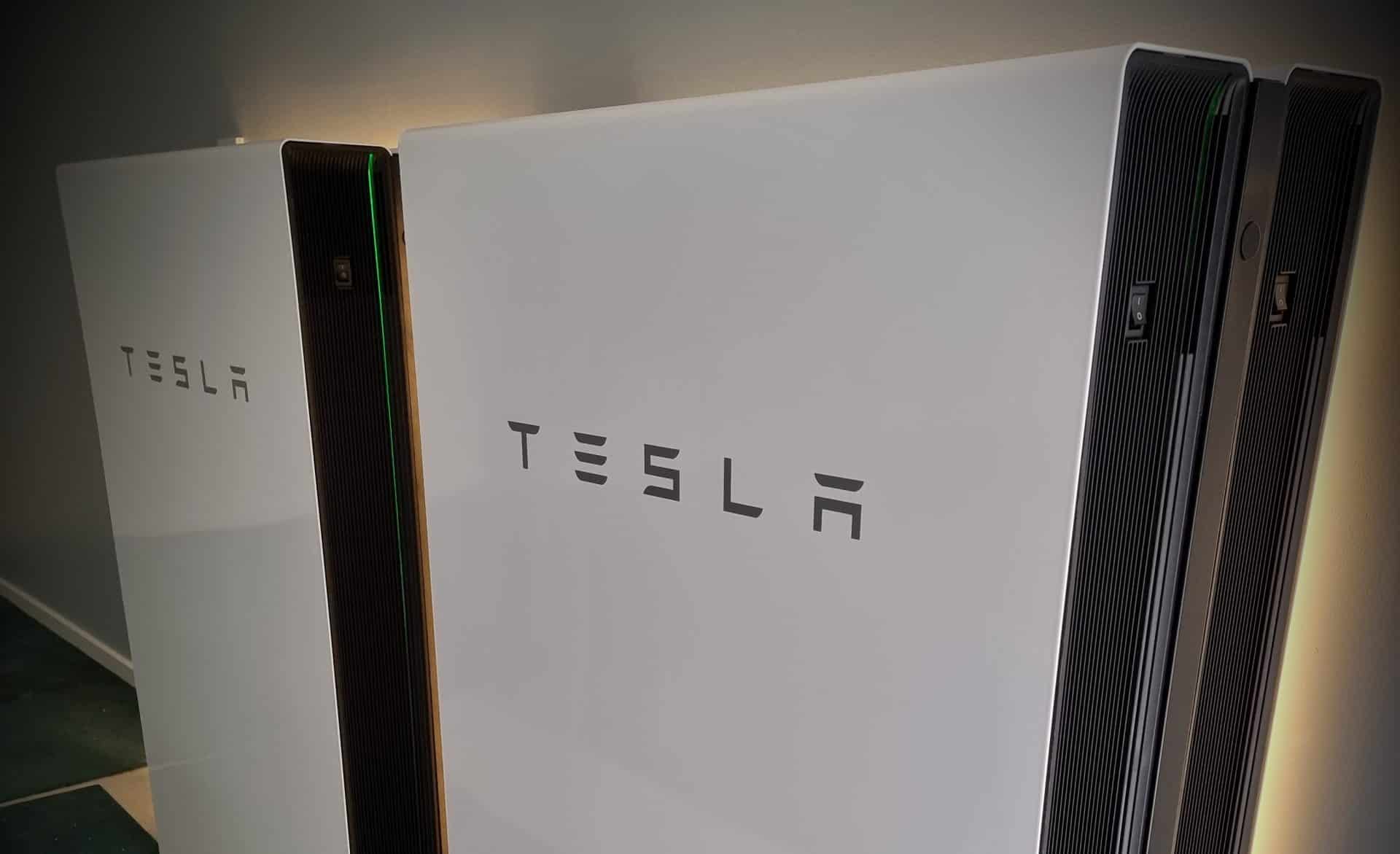 Tesla Powerwall backlit angle view 1 scaled e1682654379859